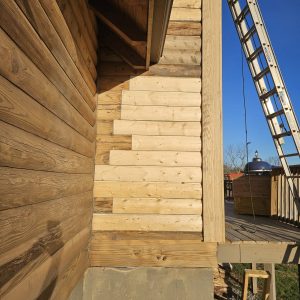 log replacement on cabin. log home maintenance work
